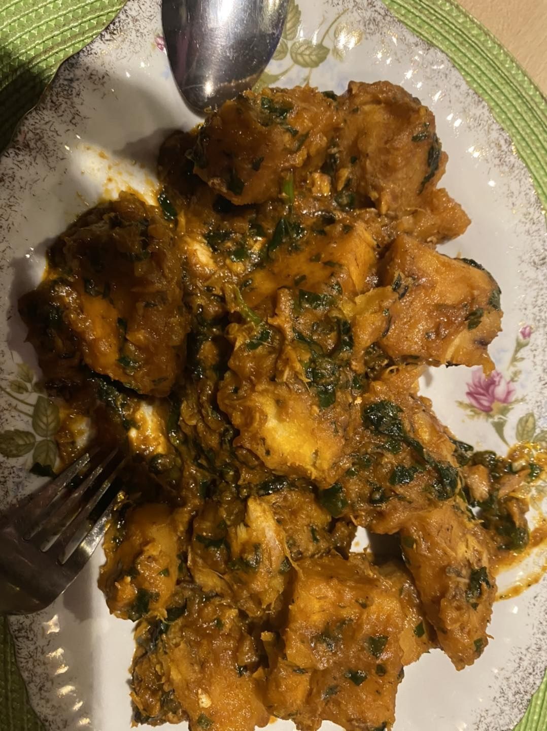 Porridge yam in a rich red palm-oil sauce with plantain